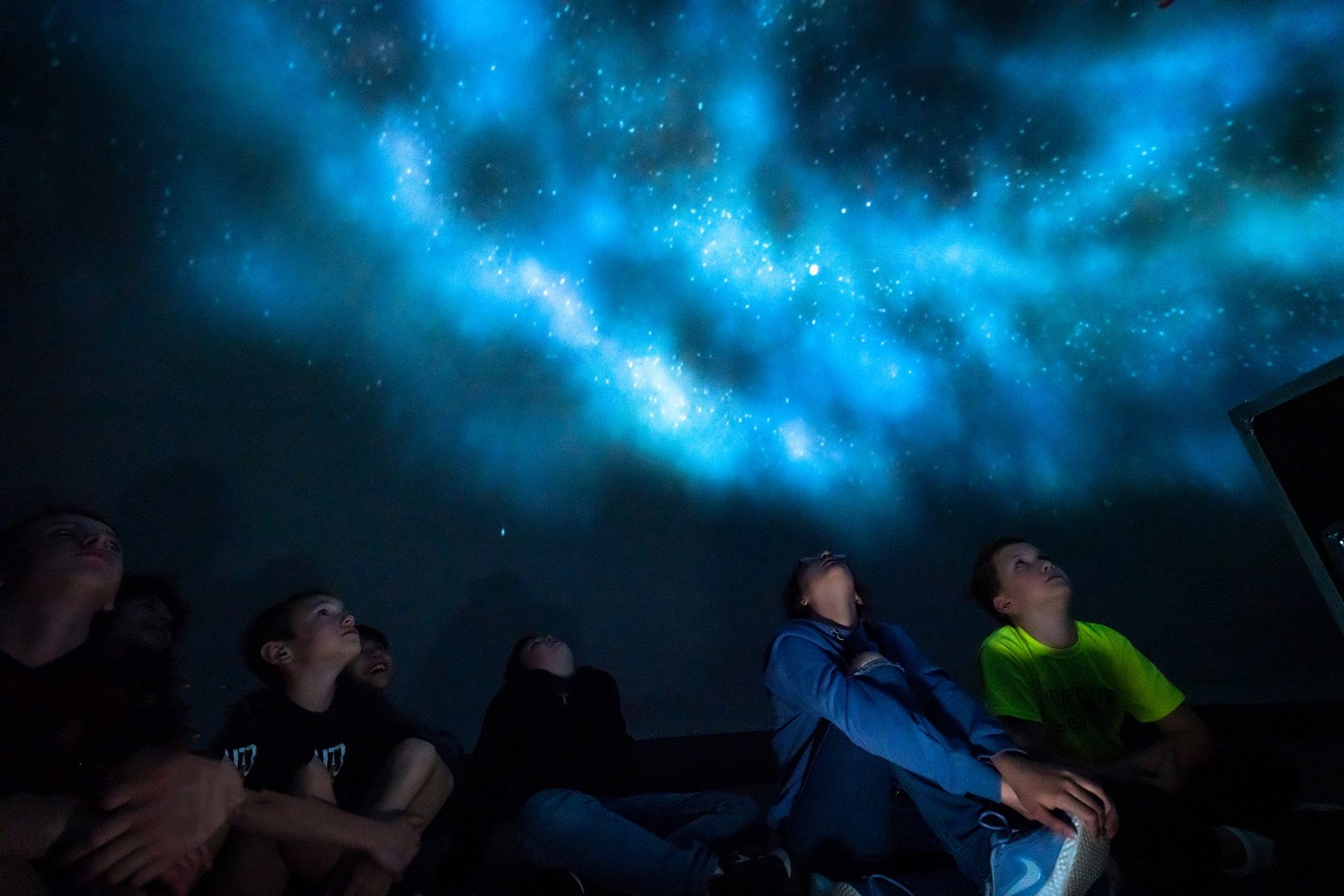 Students watching the dome