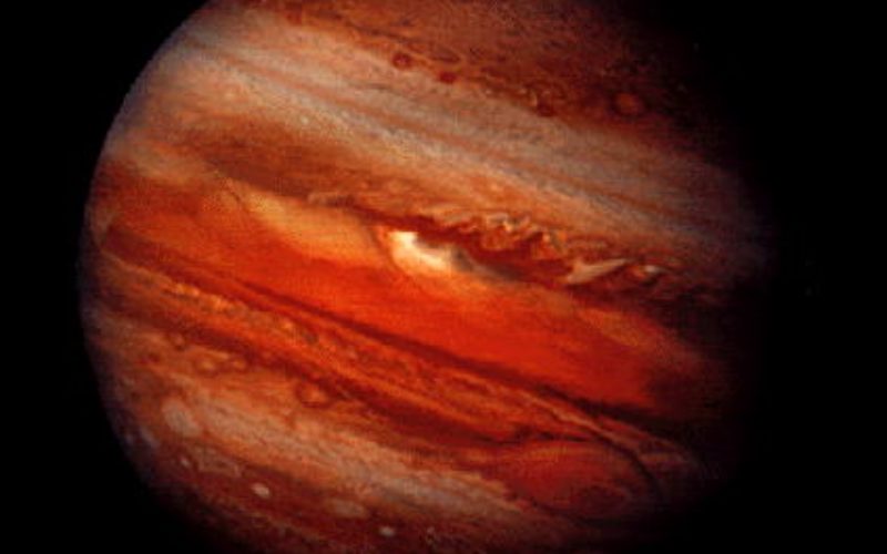 The full disk of Jupiter with its cloud bands and Great Red Spot.