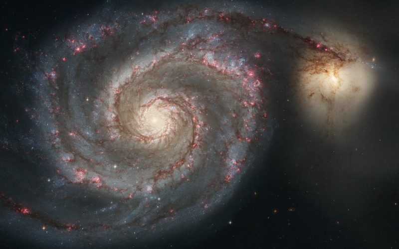 The Whirlpool Galaxy, a face-on spiral galaxy with a companion.